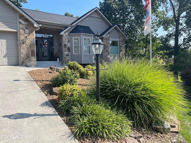 view of front of property with a garage