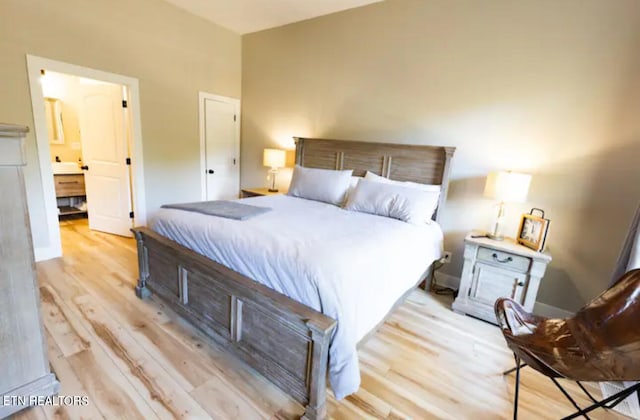 bedroom featuring light wood-type flooring