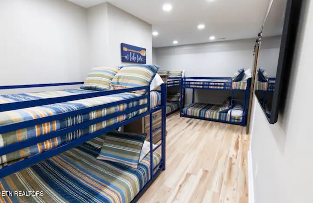 bedroom with light wood-type flooring