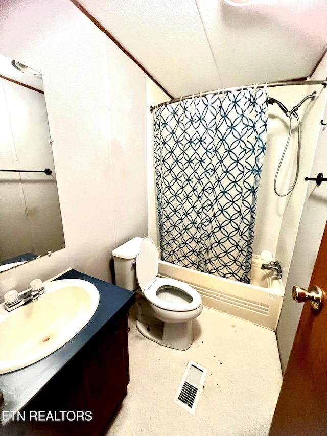 full bathroom with vanity, shower / bath combo with shower curtain, a textured ceiling, and toilet