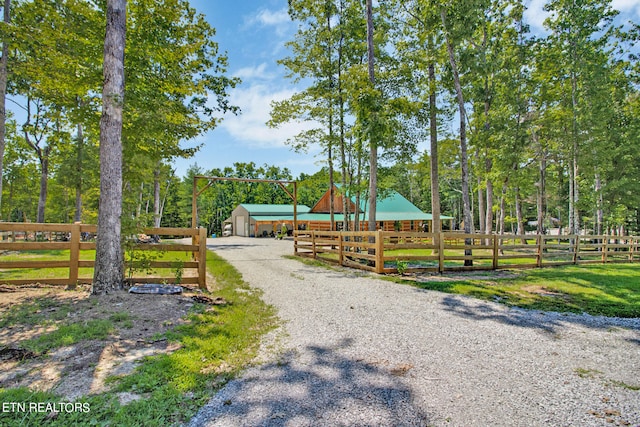 view of community featuring an outbuilding