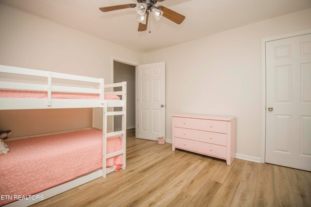 unfurnished bedroom with light hardwood / wood-style flooring and ceiling fan