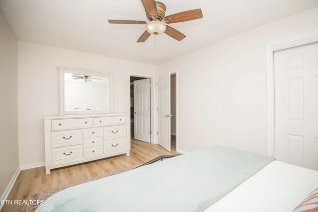 bedroom featuring ceiling fan and light wood-type flooring