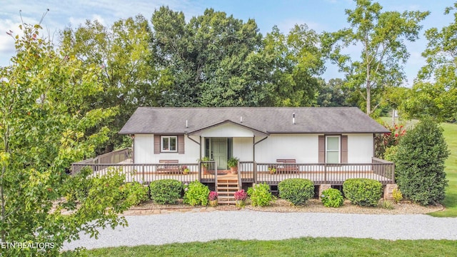 view of front of home with a deck