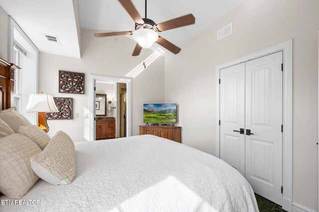 bedroom featuring ceiling fan and a closet