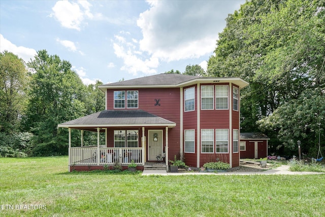 view of front of property featuring a porch and a front yard