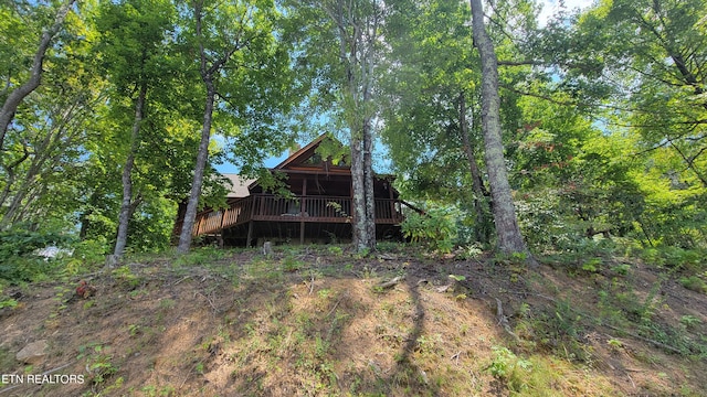 view of yard with a deck