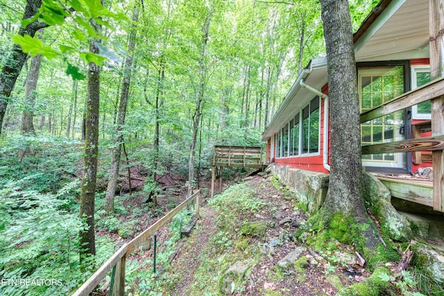 view of yard with a deck