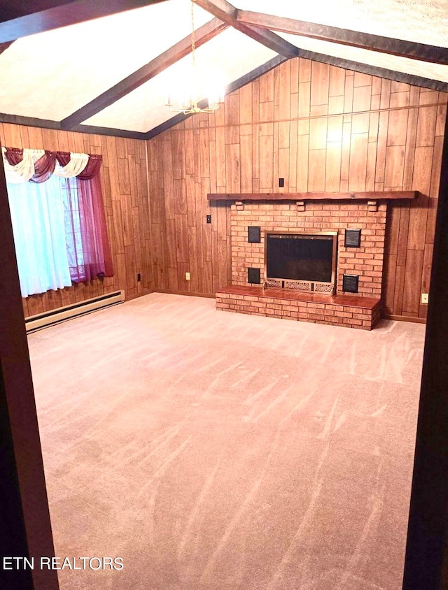 unfurnished living room featuring carpet, wooden walls, a brick fireplace, a baseboard radiator, and lofted ceiling with beams