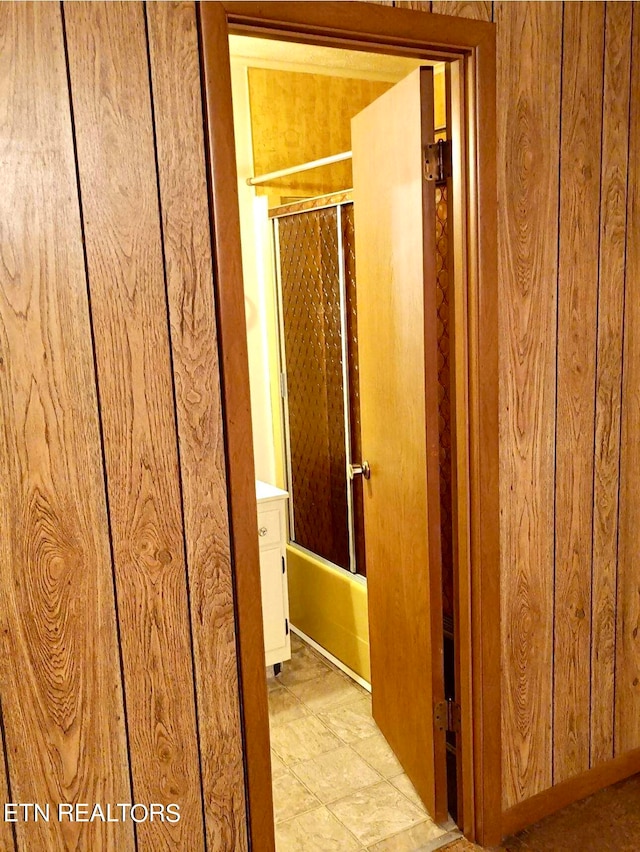 hallway with light tile patterned floors