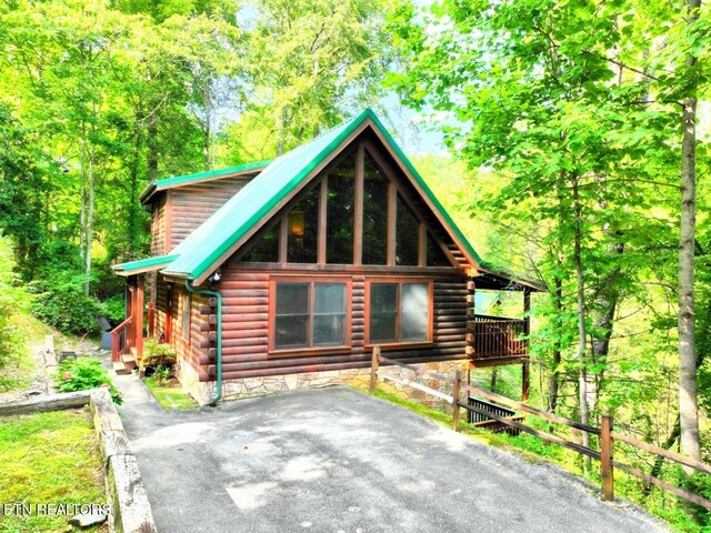 view of log cabin