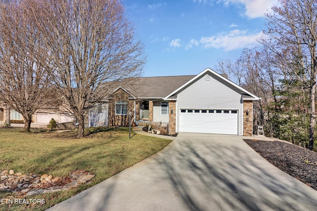 single story home with a garage and a front lawn