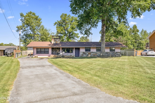 view of front of home with a front yard