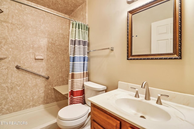 bathroom with vanity, toilet, and a shower with shower curtain