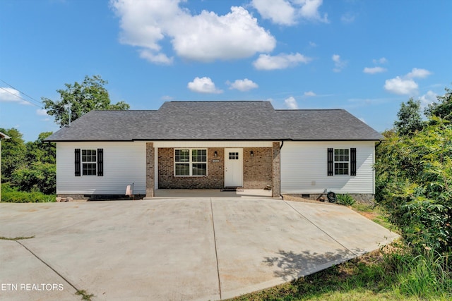 back of property featuring a patio area