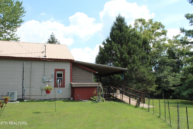 view of yard featuring central AC