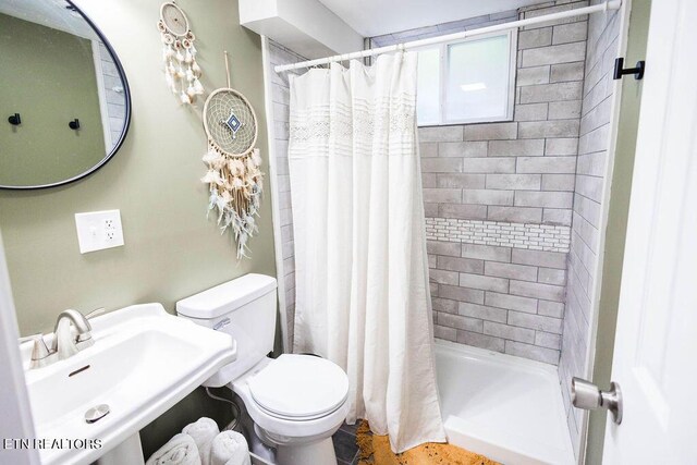 bathroom with sink and toilet