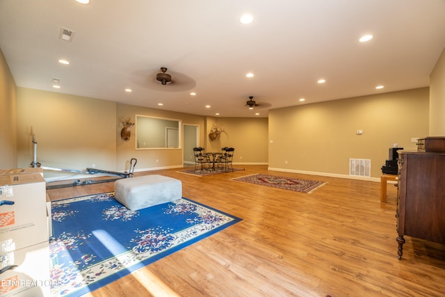 interior space featuring ceiling fan and wood-type flooring