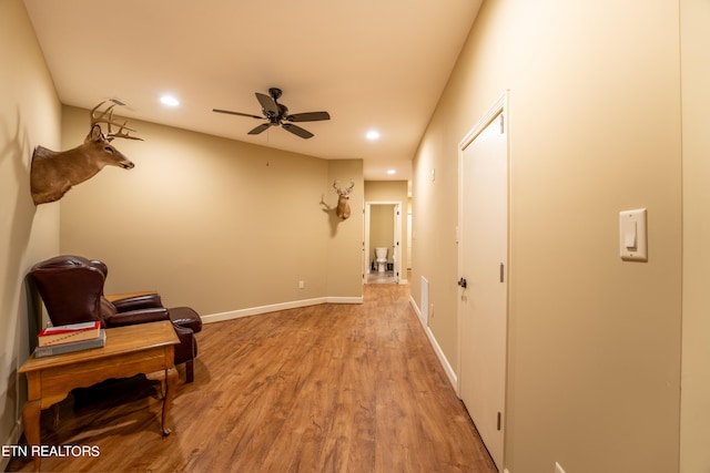 hallway featuring light wood-type flooring