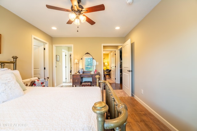 bedroom featuring ceiling fan and dark wood-type flooring