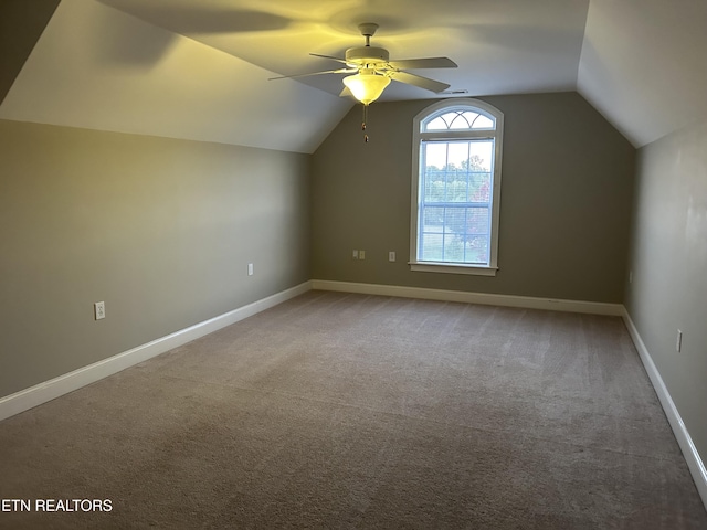 bonus room featuring carpet floors, a ceiling fan, baseboards, and vaulted ceiling