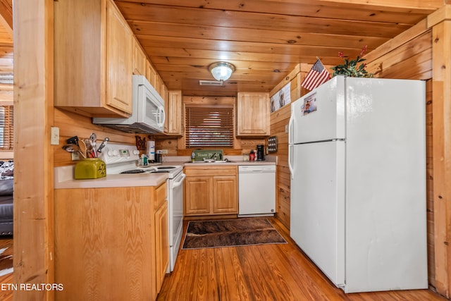 kitchen featuring wood walls, light hardwood / wood-style floors, light brown cabinets, wood ceiling, and white appliances