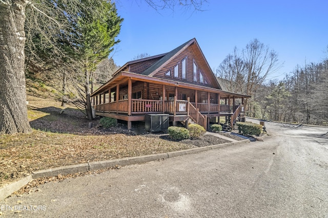 view of front of house featuring stairs and a porch