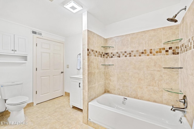 full bathroom with tile patterned floors, toilet, vanity, and tiled shower / bath