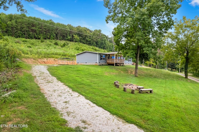 view of yard featuring a deck