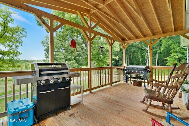 wooden terrace with area for grilling