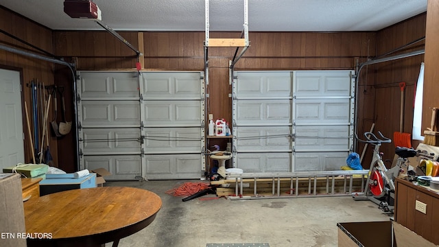 garage with wood walls
