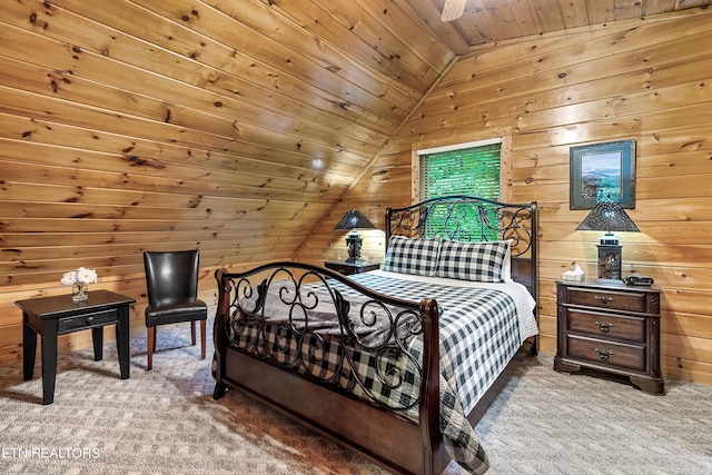 bedroom featuring wooden ceiling, lofted ceiling, wooden walls, and carpet flooring