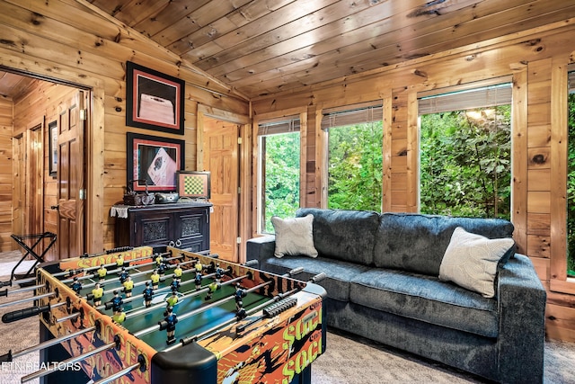 playroom with wood ceiling, carpet floors, vaulted ceiling, and wooden walls