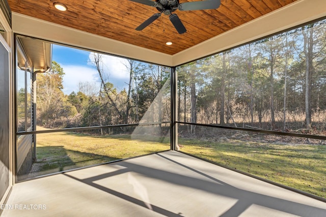 unfurnished sunroom featuring wood ceiling