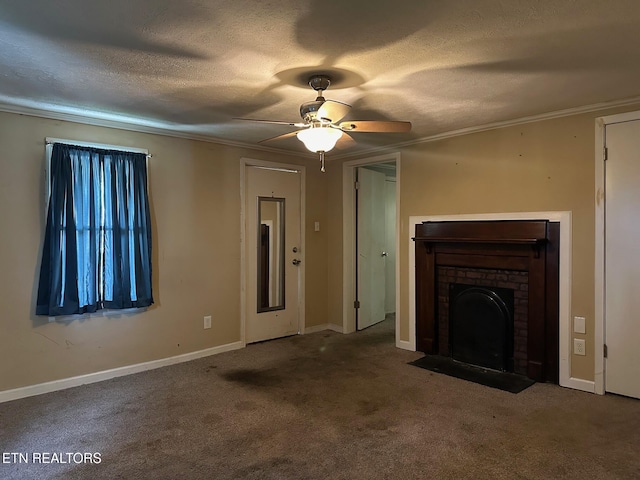 unfurnished living room with carpet, a fireplace, ornamental molding, a textured ceiling, and baseboards