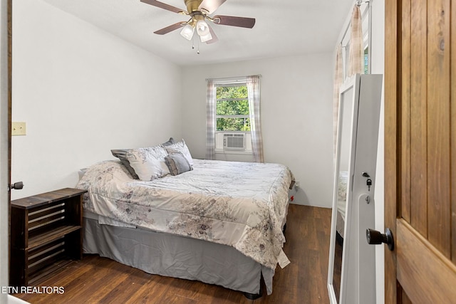 bedroom with ceiling fan, cooling unit, and dark hardwood / wood-style floors