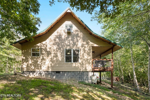 view of home's exterior with a deck