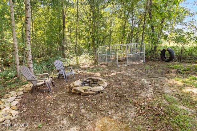 view of yard featuring a fire pit