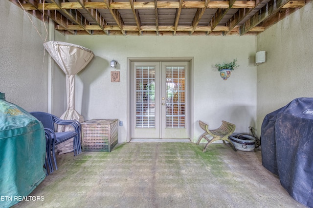 view of patio / terrace featuring french doors and a grill