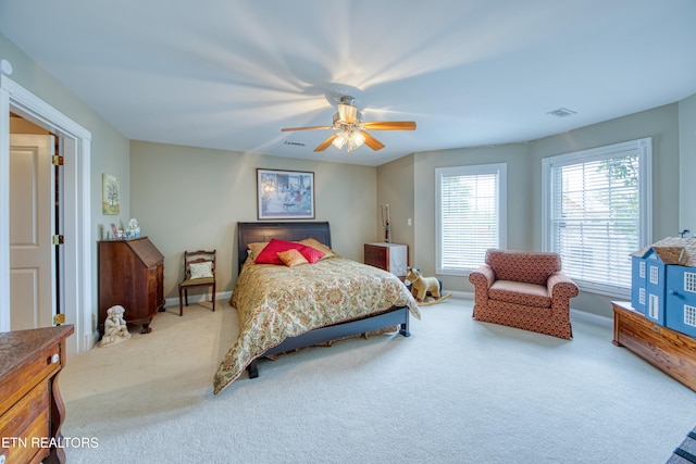 carpeted bedroom featuring ceiling fan