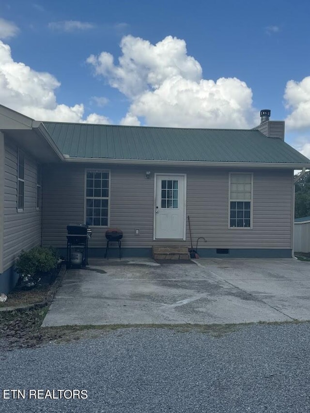 rear view of house featuring a patio area