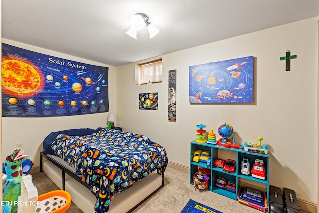 bedroom featuring light colored carpet