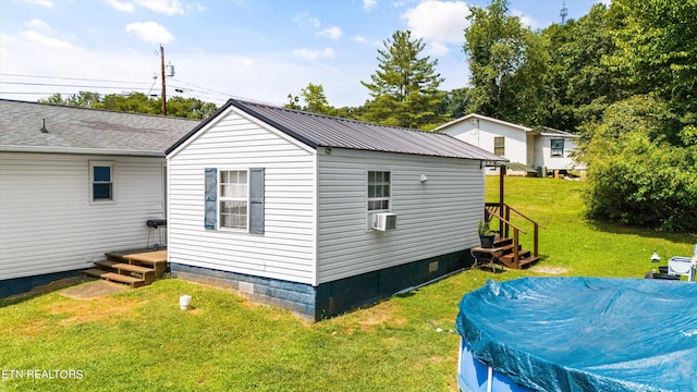 view of property exterior featuring a yard