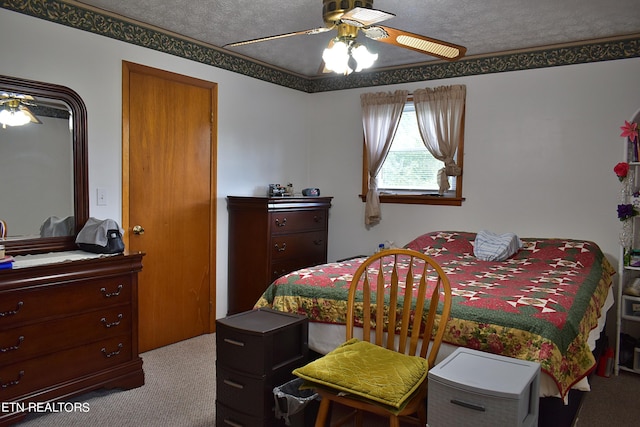 bedroom with carpet and a ceiling fan