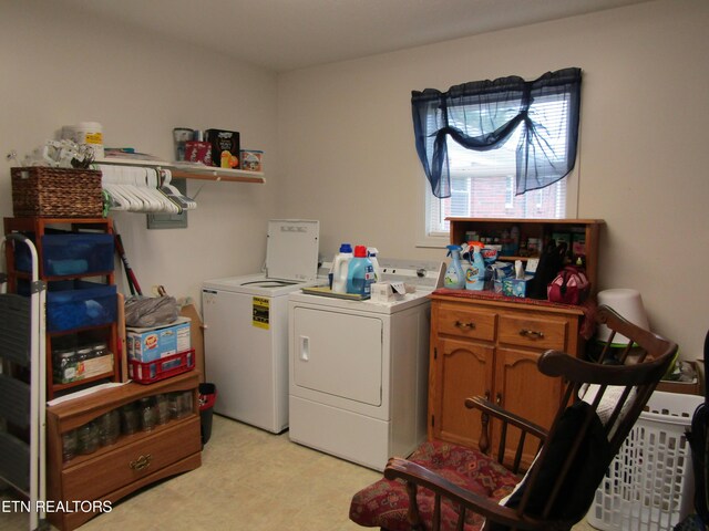 laundry area featuring laundry area and washer and dryer