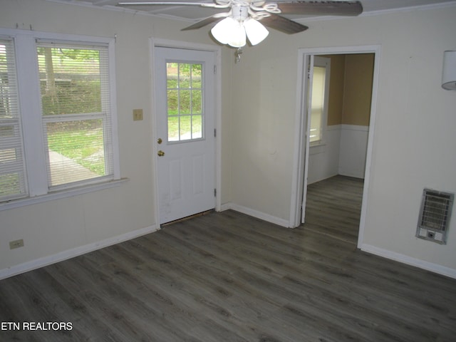 interior space featuring ceiling fan and dark hardwood / wood-style flooring