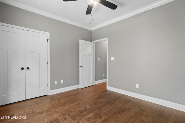 unfurnished bedroom with a closet, ornamental molding, hardwood / wood-style flooring, and ceiling fan