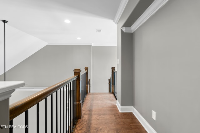 hall featuring crown molding and hardwood / wood-style flooring