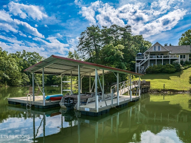 dock area featuring a water view