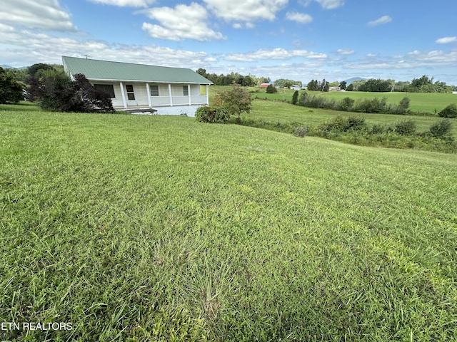 view of yard with a porch